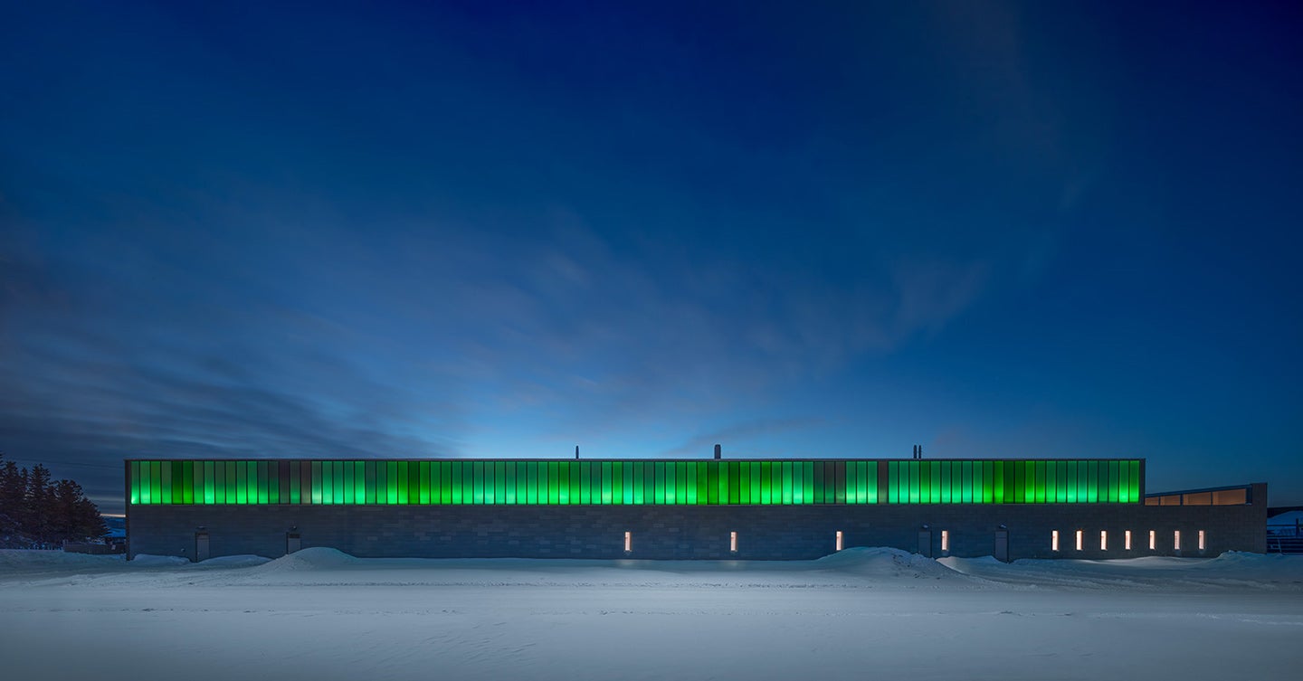 NLC building with night sky overhead