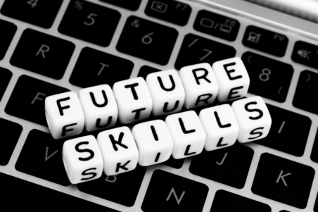 dice spelling future skills laying on keyboard