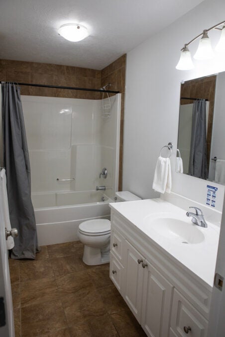 washroom — shower toilet and vanity