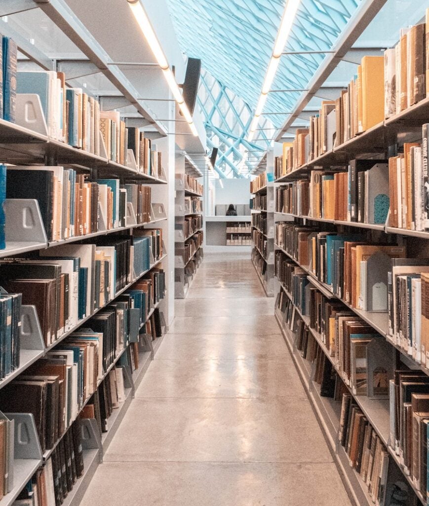 Looking down a row of books in a library