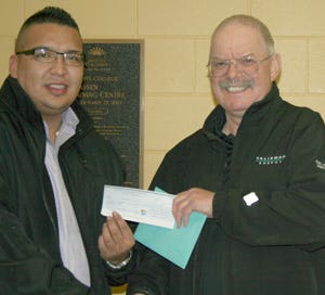 Paul Perkins of Talisman (right) with Isaiah Acko, Talisman Aboriginal New Student Award recipient.