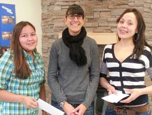Angela White of Encana Corporation (centre) with Melanie Capot-Blanc and Kristiana Bailey, recipients of Encana Aboriginal New Student Award.