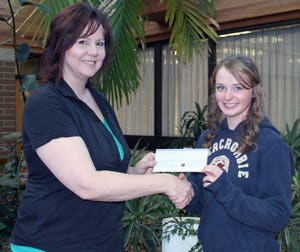 Angela Court receiving the NLC Foundation
Award of Excellence from Fort St. John
Campus Administrator Kathy Handley.
