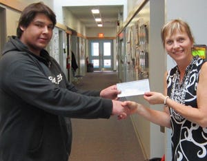 Joe Courtoreille received his award from Kathy Hecker