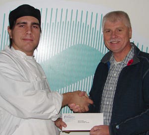 Jeff Beale of Encana Corporation (right) with Oscar Dumais, recipient of the Encana Aboriginal New Student Award.