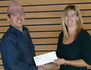 Billie-Jo Crandall, NLC Financial Aid officer (right), with Petroleum Services Association of Canada (PSAC) Award recipient Reid Felhauer.