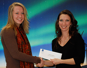 Diana Mohninger (right) presented the Fred den Ouden Memorial Award to Carolyn Mattinson.