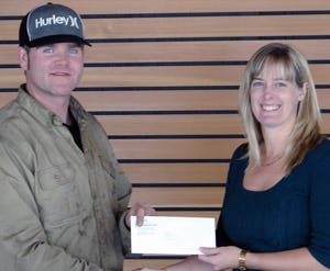 Billie-Jo Crandall, NLC Financial Aid officer (right), with Petroleum Services Association of Canada (PSAC) Award recipient Brett Miller.