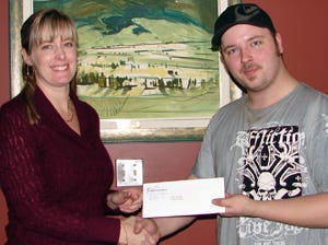 Kyle Moran received his award from Billie-Jo Crandall